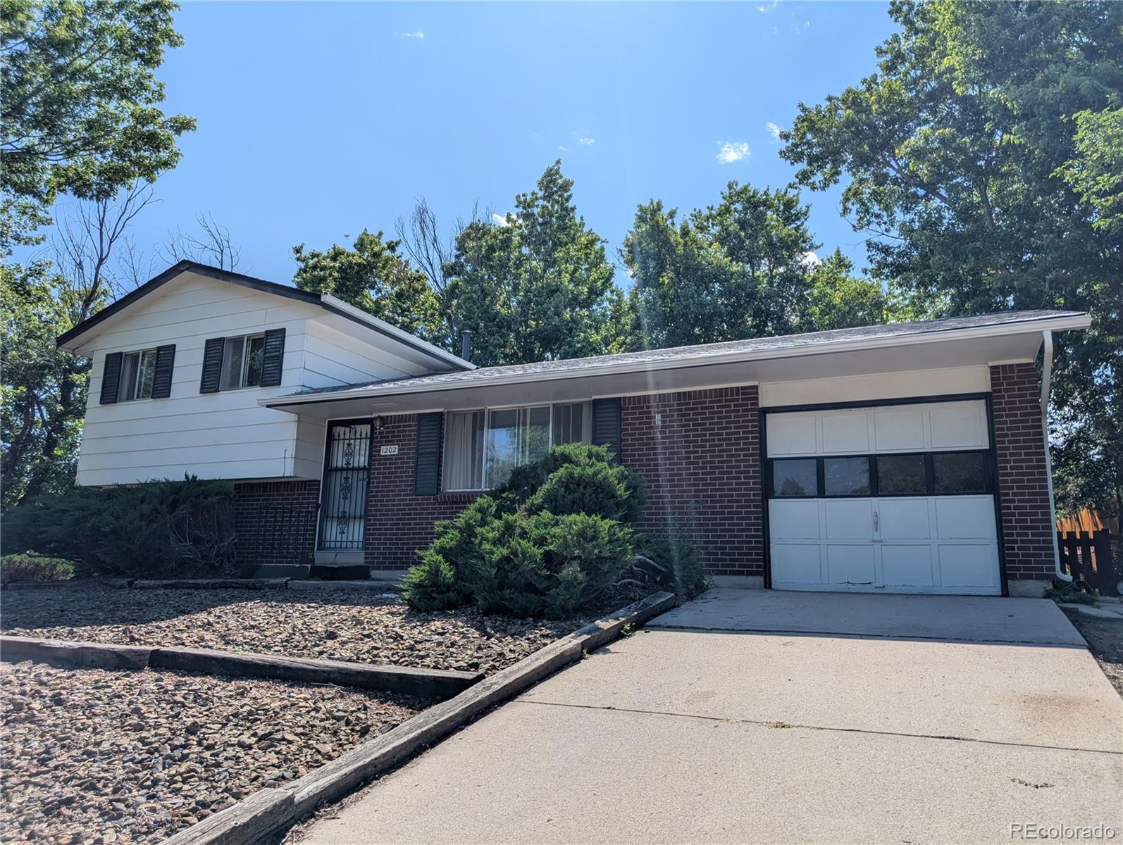 1202 Wooten Road, Colorado Springs CO 80915