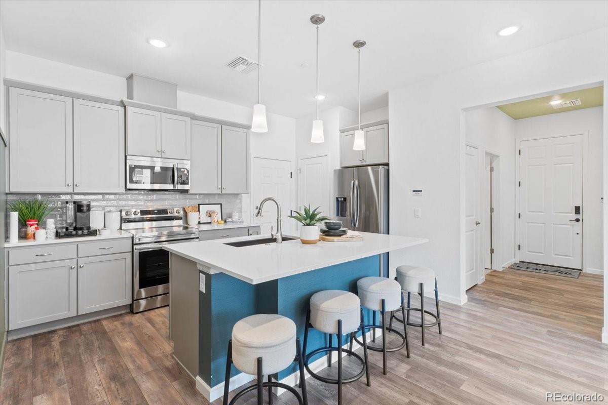 6153 N Ceylon Street Unit 9-102, Denver CO 80249