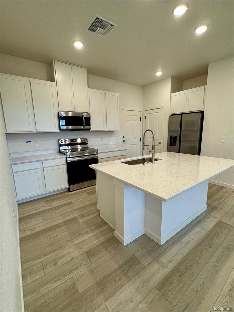 6153 N Ceylon Street Unit 108, Denver CO 80249