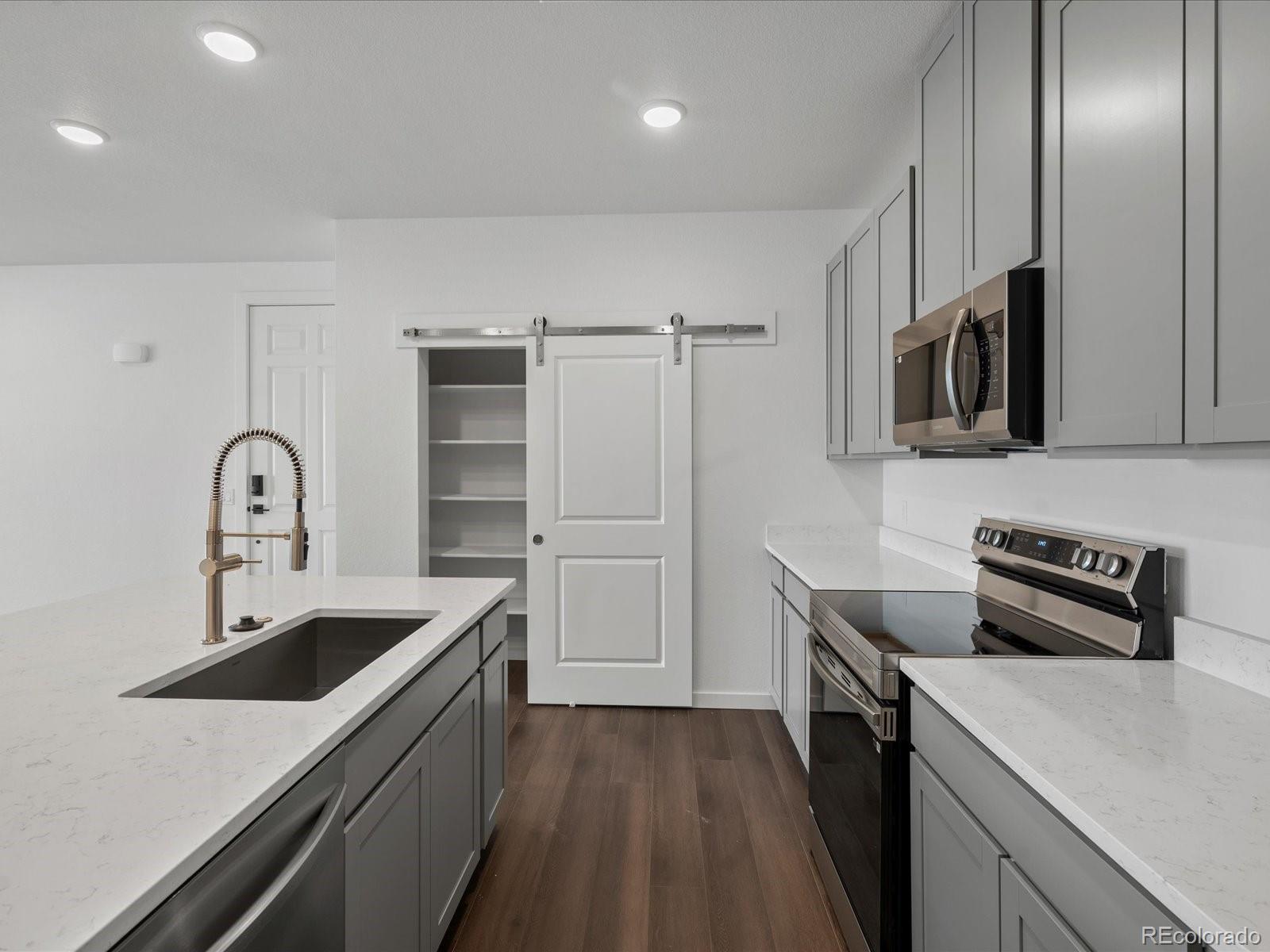 6153 N Ceylon Street Unit 206, Denver CO 80249