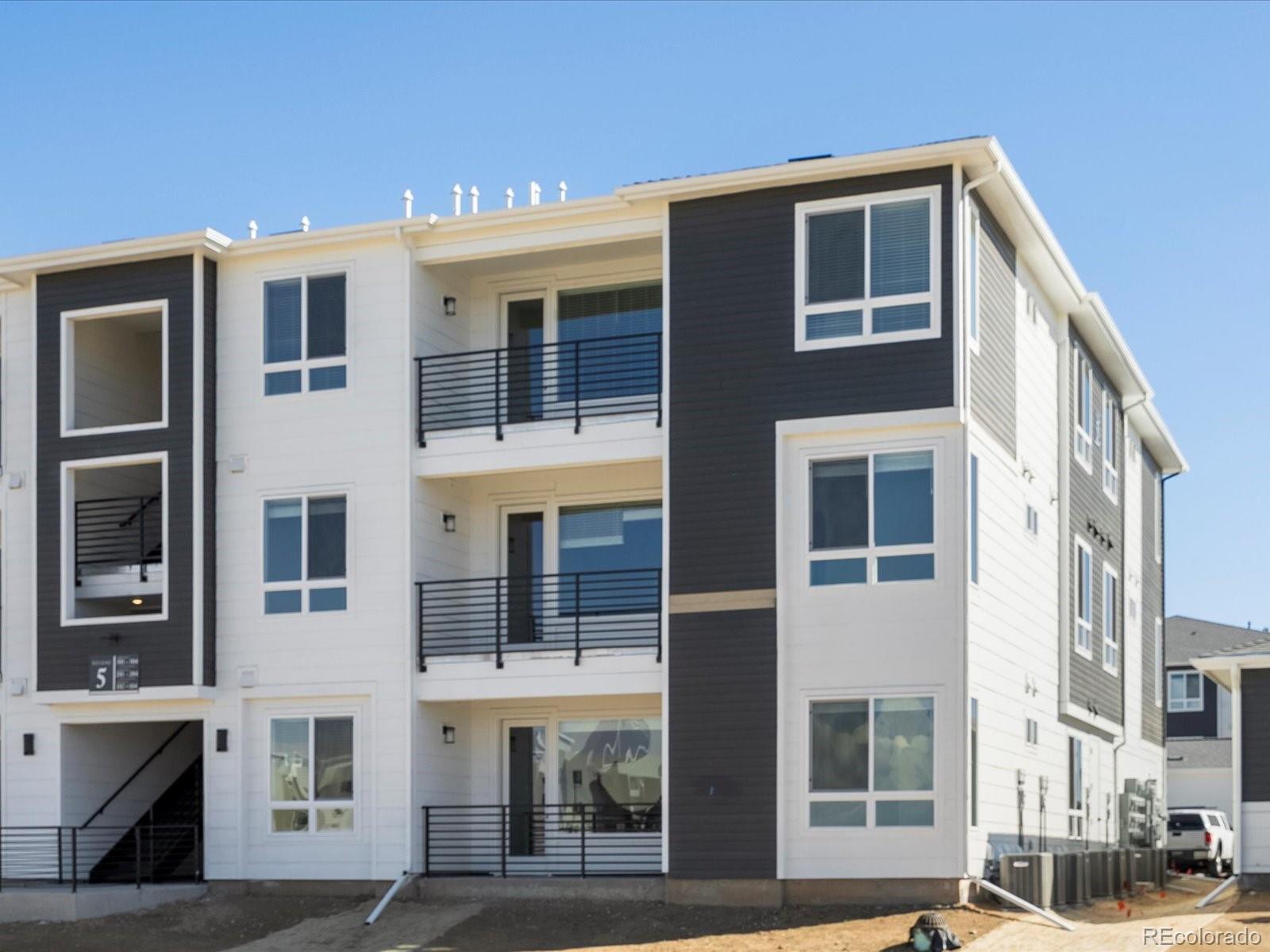 6153 N Ceylon Street Unit 302, Denver CO 80239